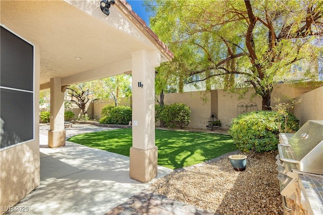 view of patio with a fenced backyard