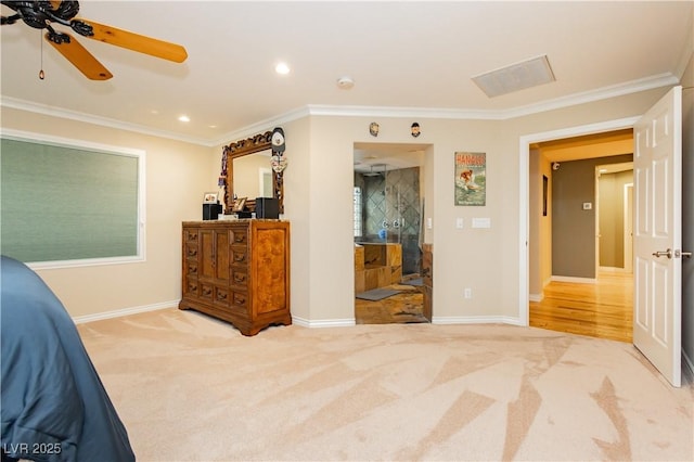 bedroom featuring baseboards, carpet floors, and crown molding