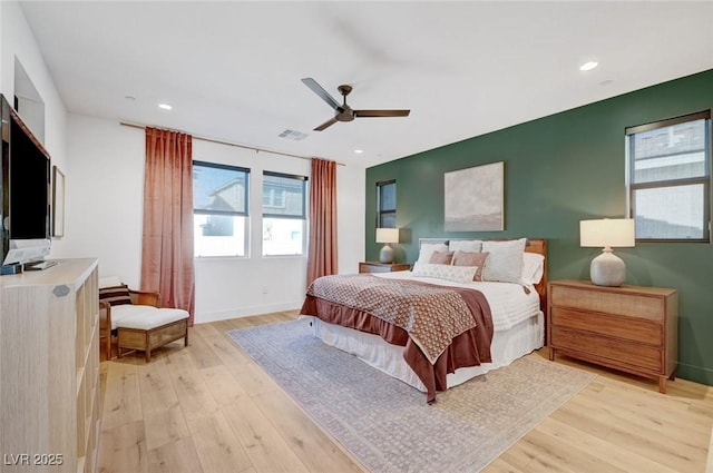 bedroom featuring recessed lighting, a ceiling fan, baseboards, visible vents, and light wood finished floors