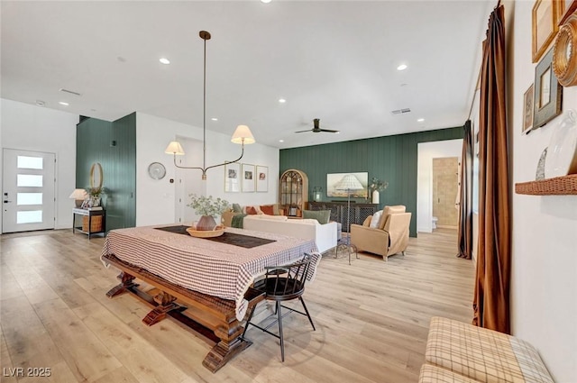 dining space featuring light wood-style floors, recessed lighting, and visible vents