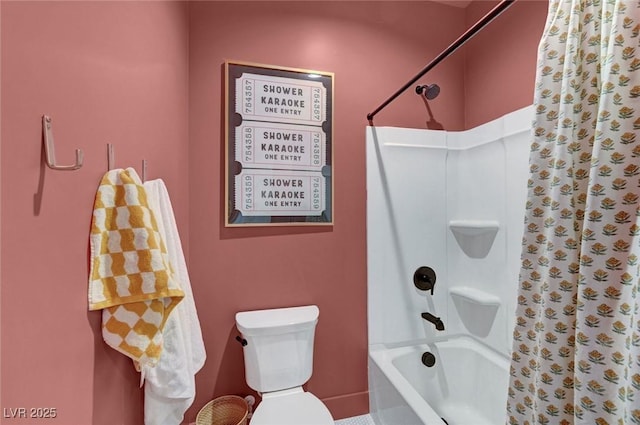 full bathroom featuring shower / bath combination with curtain and toilet