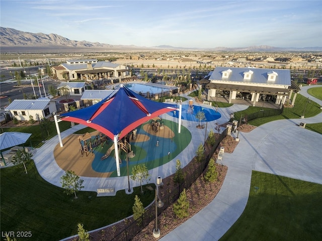 view of swimming pool featuring a mountain view