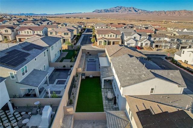 bird's eye view featuring a residential view and a mountain view