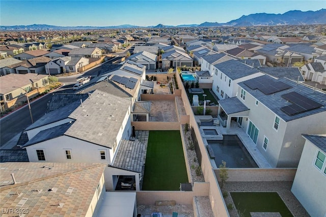 birds eye view of property featuring a residential view and a mountain view