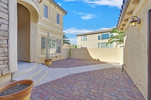 view of patio with fence