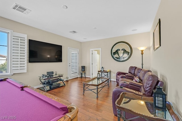 living area featuring pool table, visible vents, baseboards, and wood finished floors