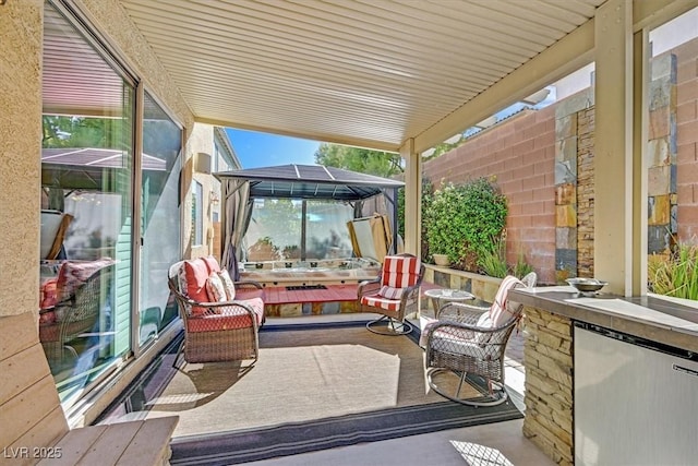 view of patio featuring an outdoor kitchen