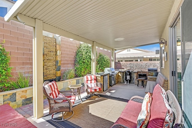 view of patio featuring grilling area and an outdoor kitchen