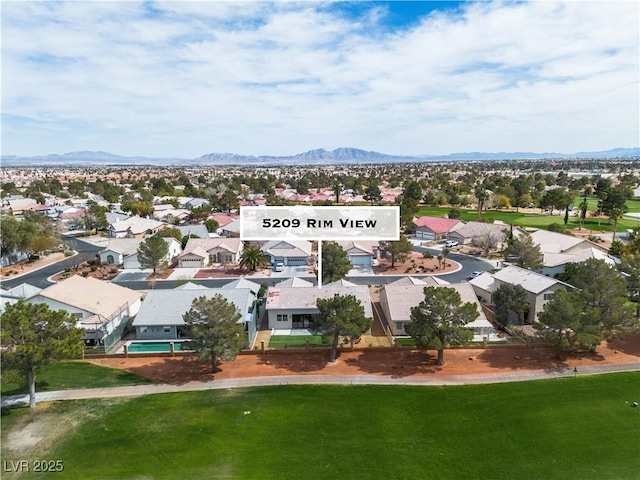 bird's eye view featuring a mountain view and a residential view