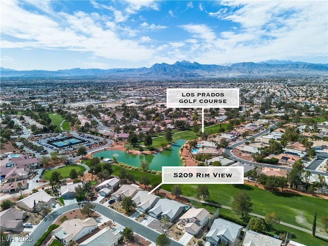 birds eye view of property with a residential view and a water and mountain view