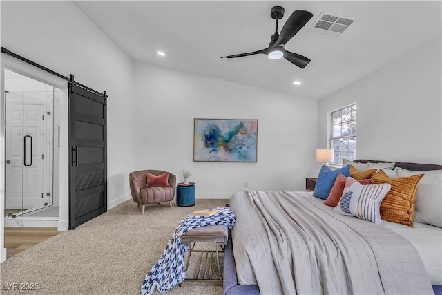 carpeted bedroom featuring baseboards, visible vents, recessed lighting, vaulted ceiling, and a barn door