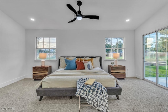 bedroom featuring access to exterior, baseboards, and carpet