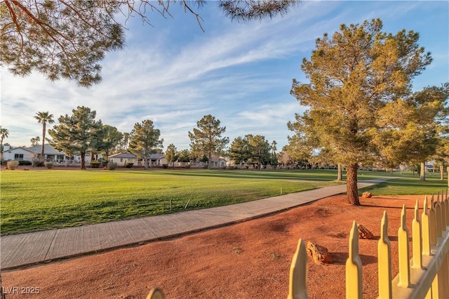 view of home's community with a lawn