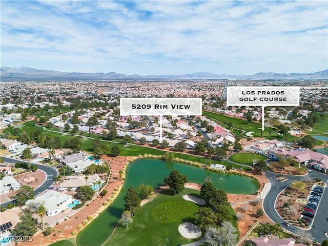 bird's eye view with a residential view and a water and mountain view