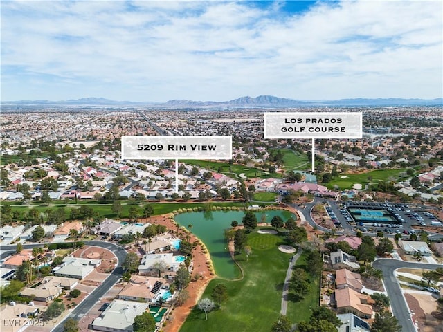 birds eye view of property with a residential view and a water and mountain view