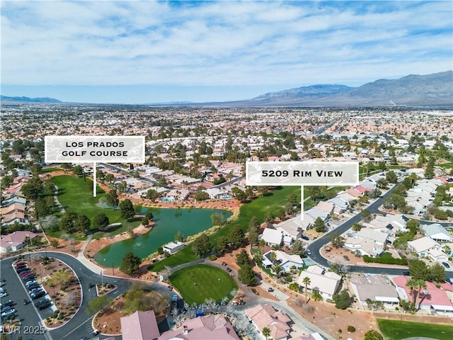 bird's eye view with a residential view and a water and mountain view