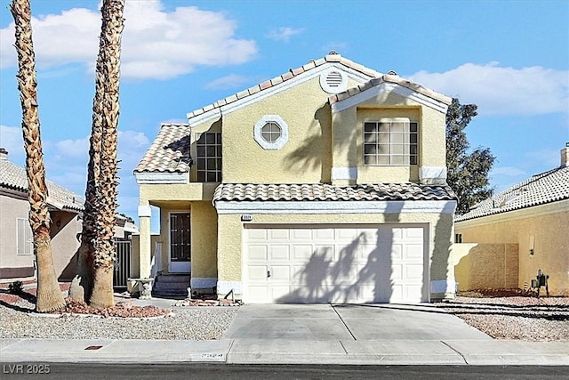 view of front facade with concrete driveway, a tiled roof, an attached garage, and stucco siding