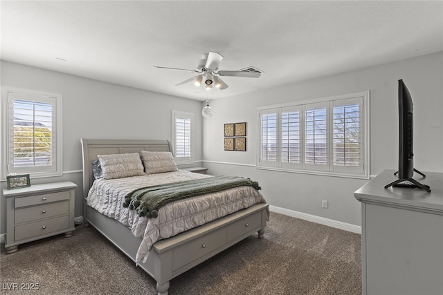 bedroom with a ceiling fan, visible vents, dark carpet, and baseboards