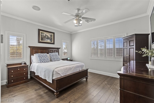 bedroom with crown molding, baseboards, and dark wood-type flooring