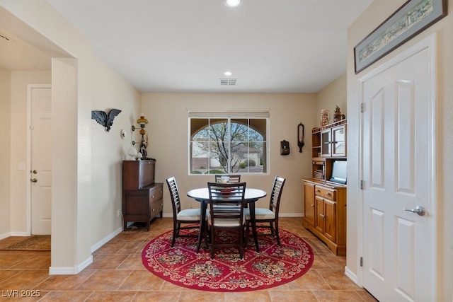 dining space with recessed lighting, visible vents, and baseboards