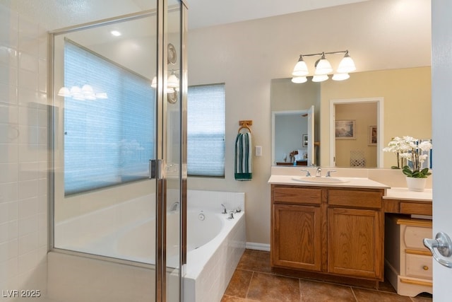 bathroom featuring vanity, a shower stall, a bath, and tile patterned floors