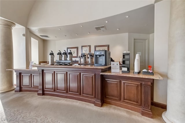 bar with light carpet, decorative columns, visible vents, and recessed lighting