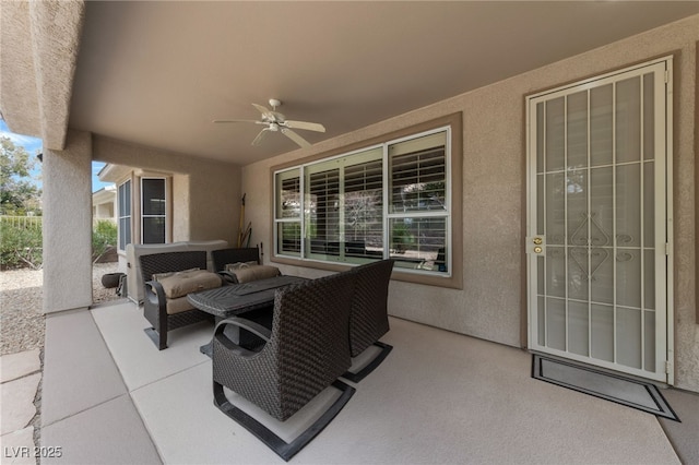 view of patio with ceiling fan