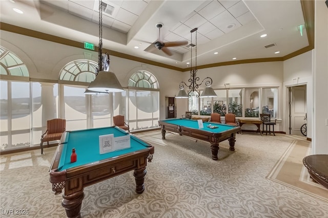 game room featuring a high ceiling, billiards, visible vents, a ceiling fan, and a raised ceiling