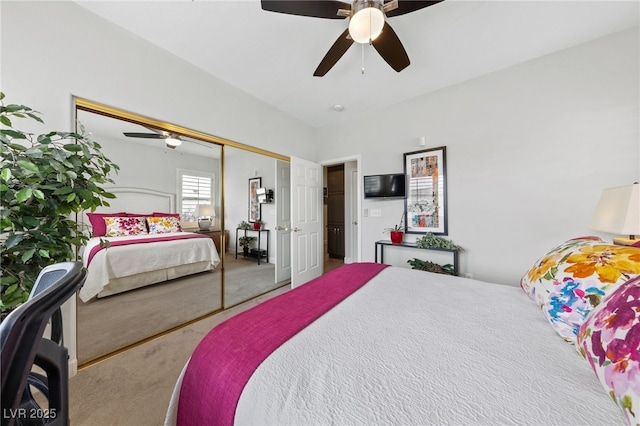 bedroom featuring carpet, a closet, and ceiling fan