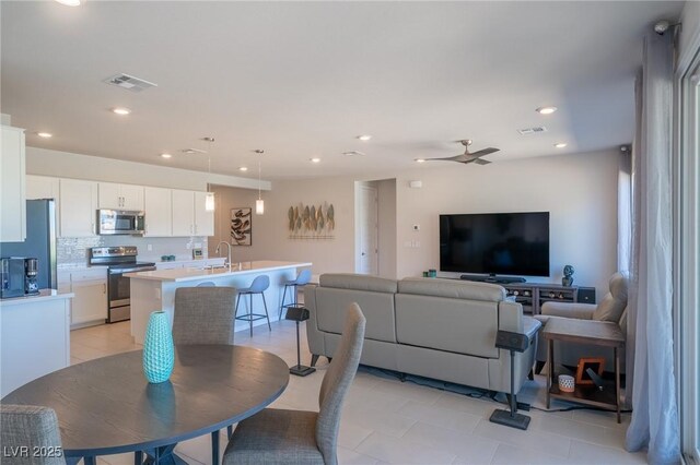 4400 E Cactus Canyon Dr, Pahrump, NV 89061 - dining room featuring light tile patterned floors, visible vents, a ceiling fan, and recessed lighting