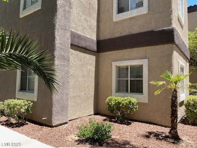 view of property exterior with stucco siding