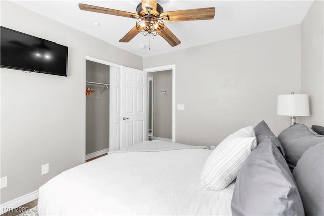 bedroom featuring a closet, a ceiling fan, and baseboards