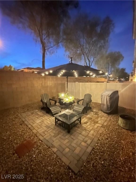 view of patio featuring a fenced backyard and area for grilling