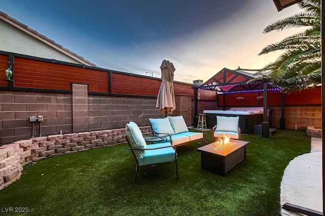 view of patio featuring a gazebo, fence, an outdoor living space with a fire pit, and a hot tub