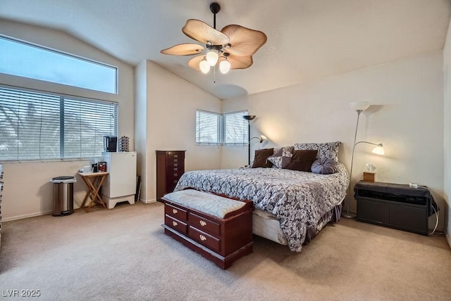 bedroom with carpet floors, a ceiling fan, and vaulted ceiling