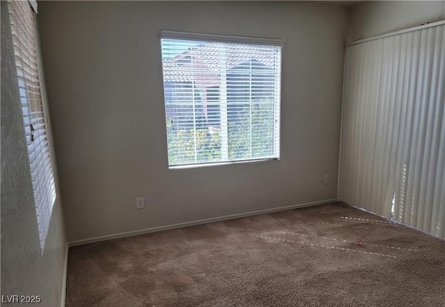 spare room with carpet flooring