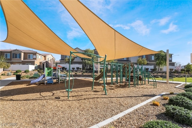 communal playground with a residential view