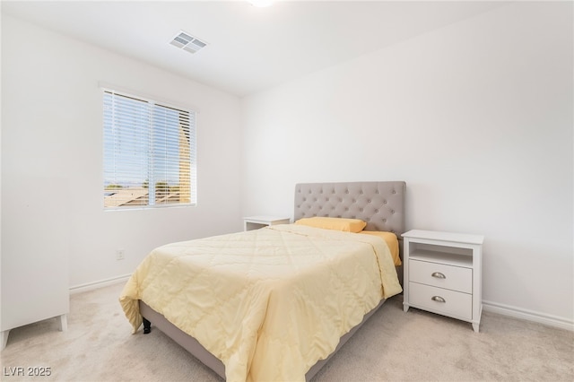 bedroom with light carpet, baseboards, and visible vents