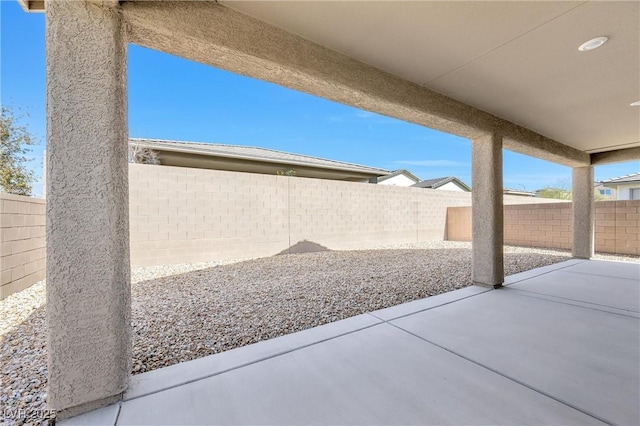 view of patio with a fenced backyard