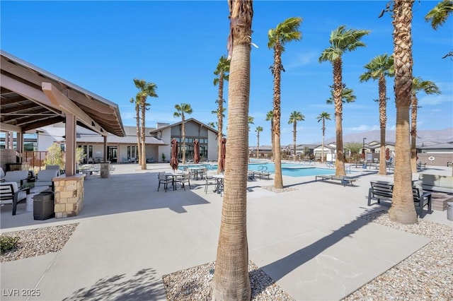 pool with a patio area