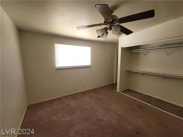 unfurnished bedroom featuring a ceiling fan, a closet, carpet flooring, and baseboards