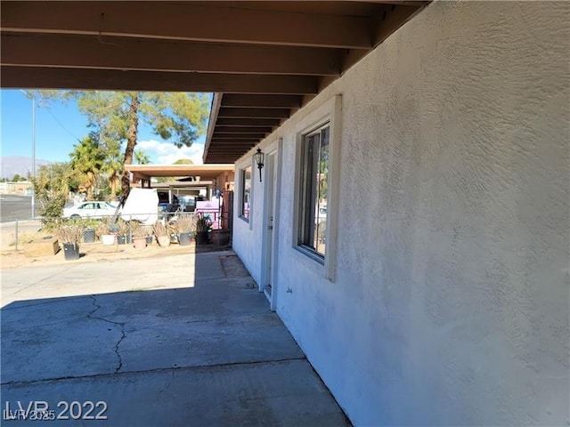 view of patio with an attached carport