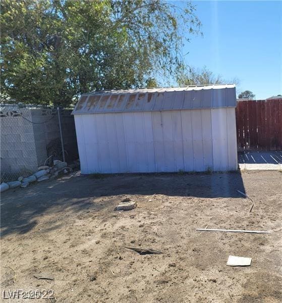 view of shed featuring a fenced backyard