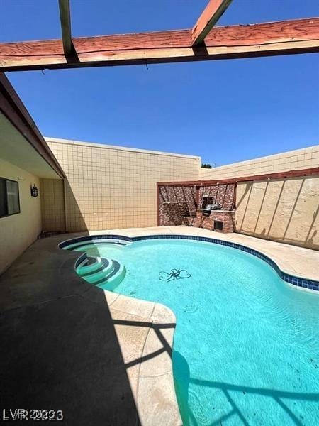 view of pool featuring a fenced in pool