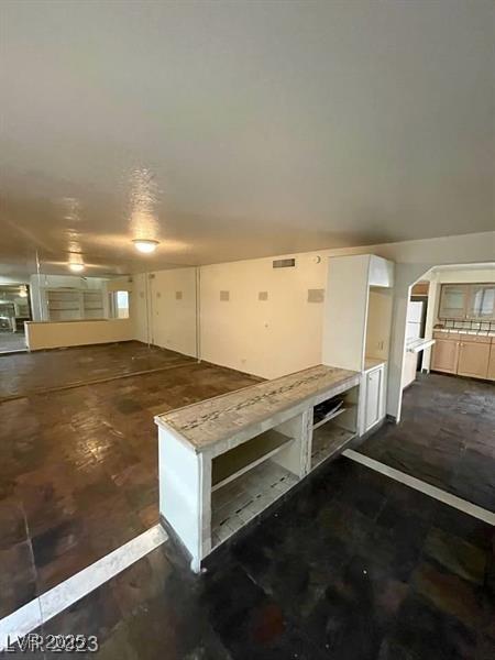 mudroom with concrete flooring and visible vents