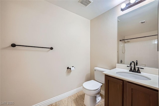 full bath featuring visible vents, toilet, baseboards, walk in shower, and vanity