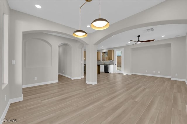 unfurnished living room with light wood-style floors, recessed lighting, visible vents, and ceiling fan