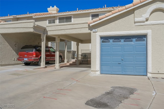 garage with driveway