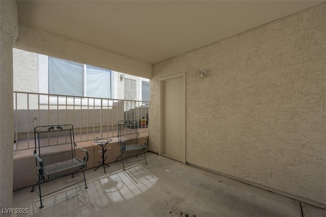 view of patio / terrace featuring a balcony