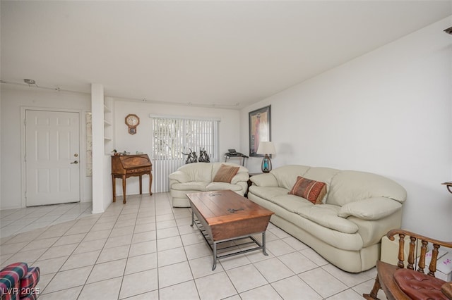 living area featuring light tile patterned floors